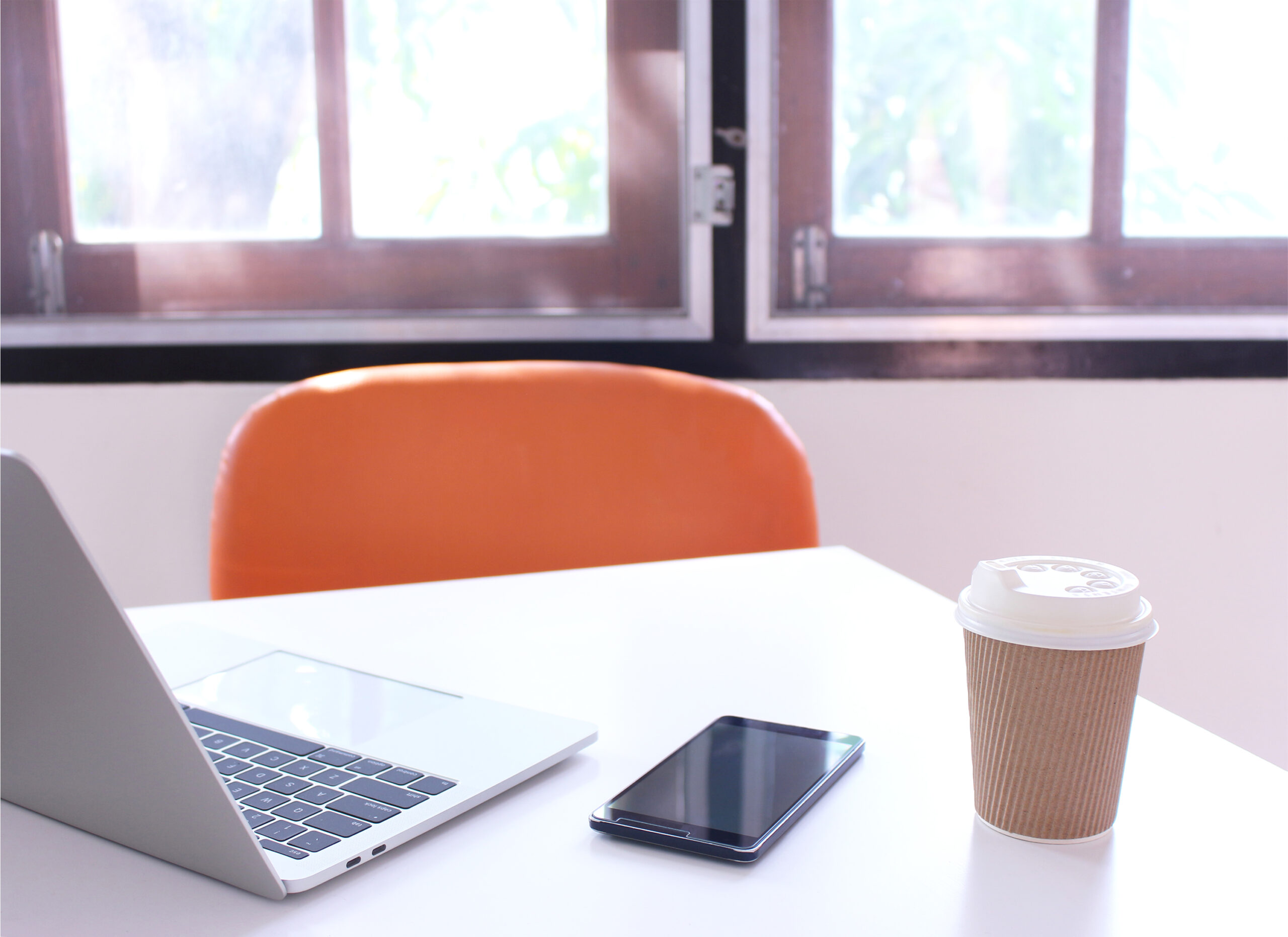 office table desk. workspace with notebook and smartphone,cup co